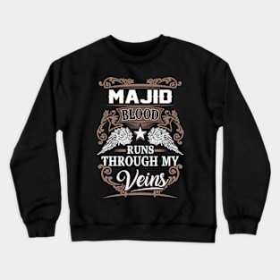 Majid Name T Shirt - Majid Blood Runs Through My Veins Gift Item Crewneck Sweatshirt